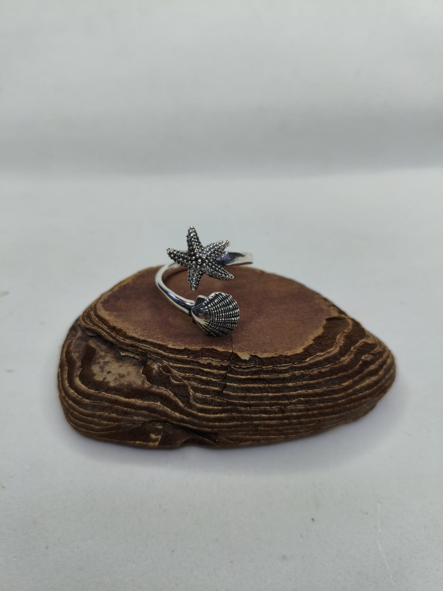 Anello Contrarie stella e conchiglia - immagine 3